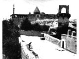 Not a trace of the Phrygian-Hellenic city of Iconium in the Roman province of Galatia is visible among the buildings of the Turkish town of Konya erected on its site. An early photograph.